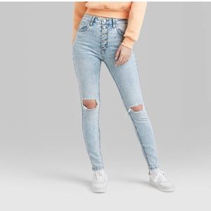 Women's Super-High Rise Distressed Skinny
Jeans - Wild Fable Light Wash
